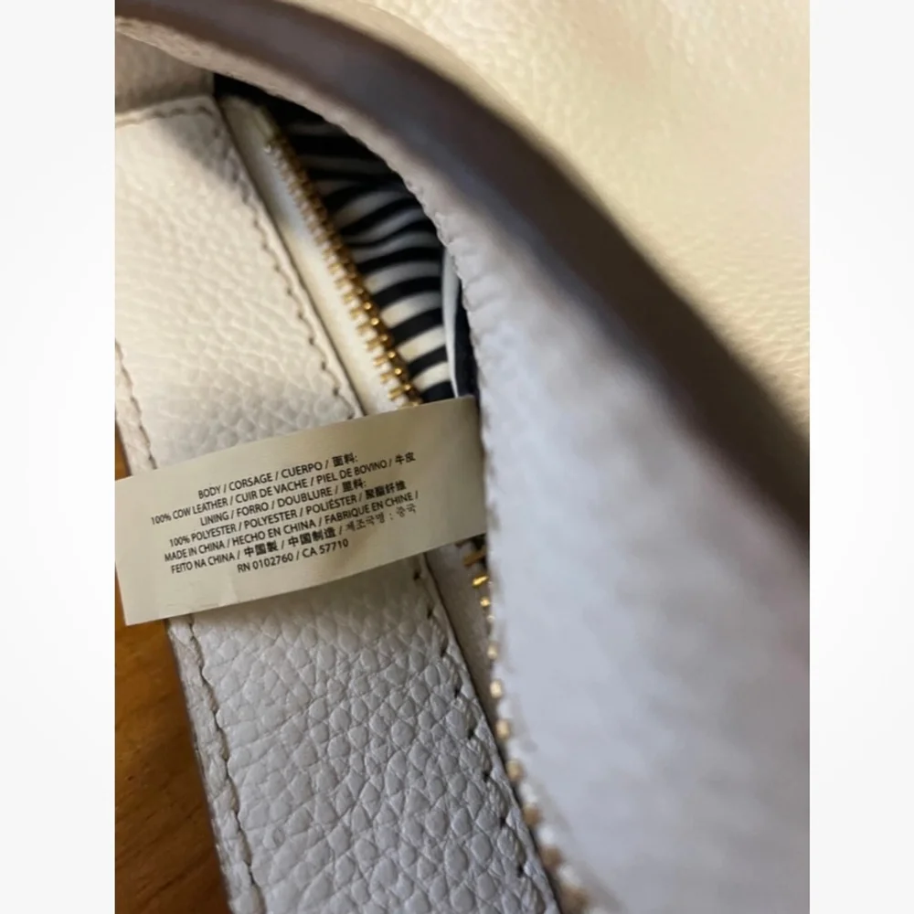 Kate Spade NY Orchard Street
Hemsley Pebbled Leather Handbag
Bright White - Picture 15 of 16